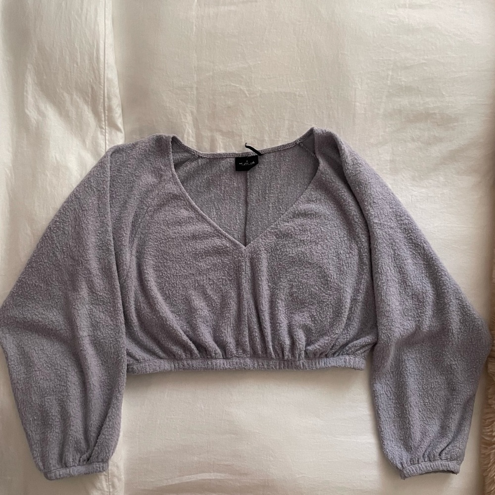 Out from under sweater top